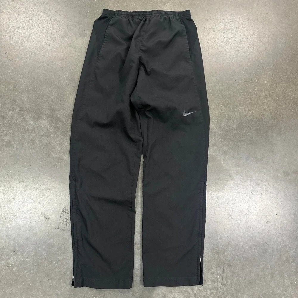 Vintage Y2K Nike Track Pants w ankle zip and leg perforations Size Medium
